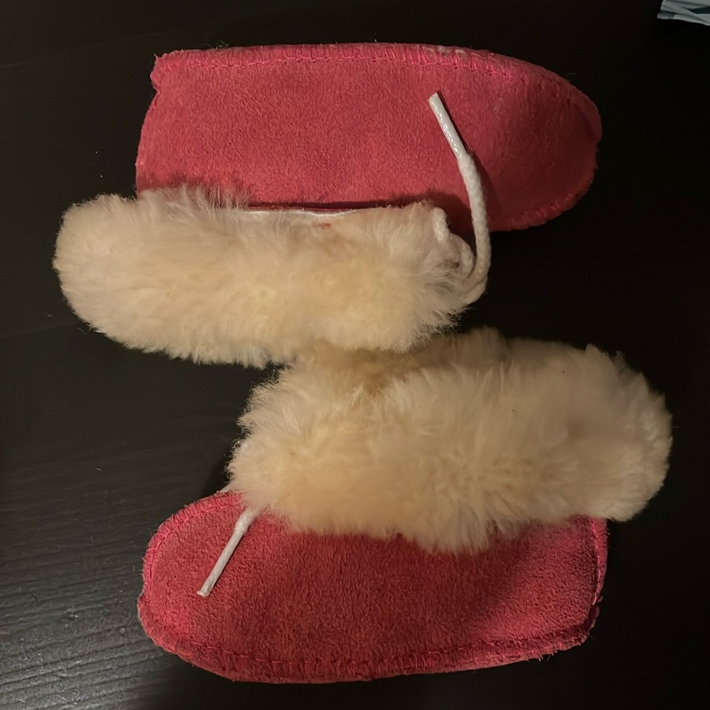 Size 1 sheepskin infant slippers; pink